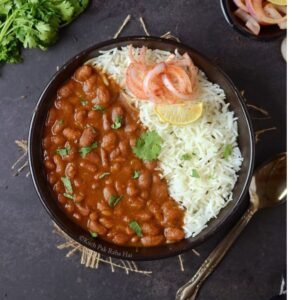 Rajma Thali  (Rajma, 1 Dal, 4 Tawa roti,  Rice, Raita, Salad)