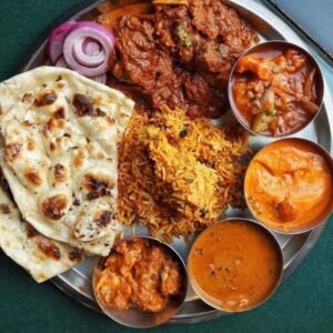 Non-Veg Thali(Chicken dish, Dal, 4 Tawa roti,  Rice, Raita, Salad)